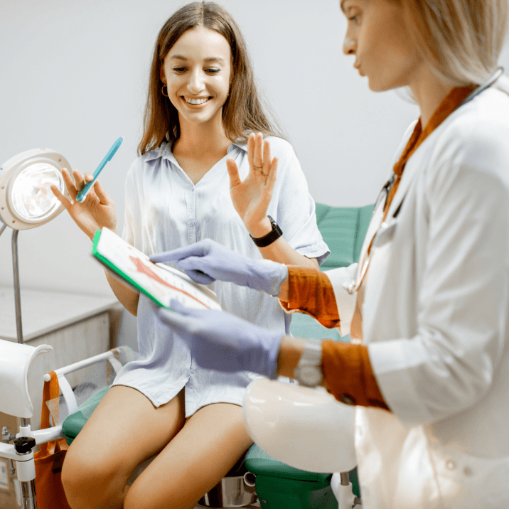 Gynecologist With Female Patient In The Office